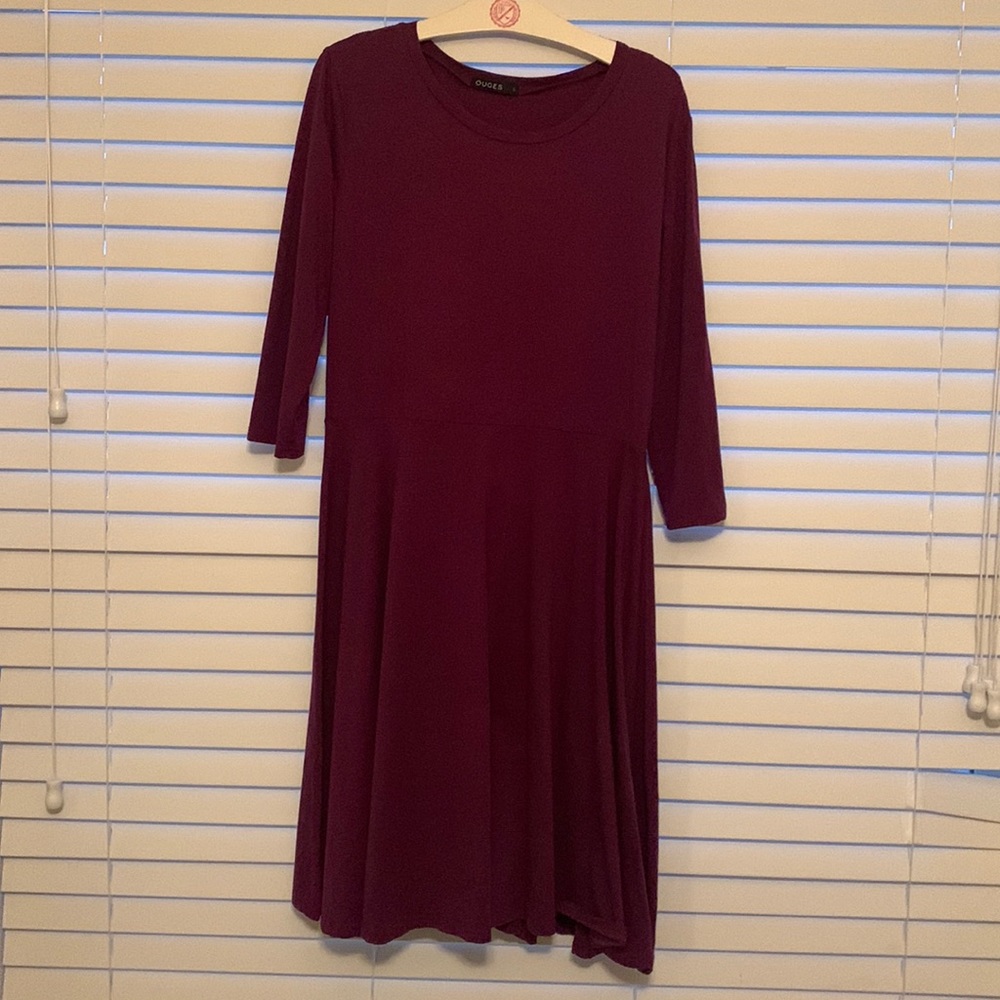 Quarter sleeve skater dress, mid length.